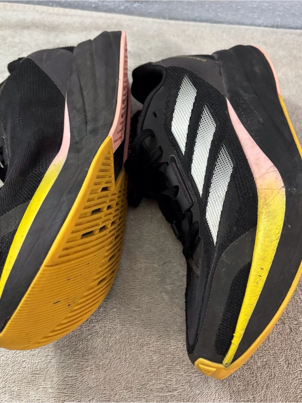 adidas unisex  Black Duramo Lightstrike Running Shies SZ Mens 6.5/7, Womens 85 9
